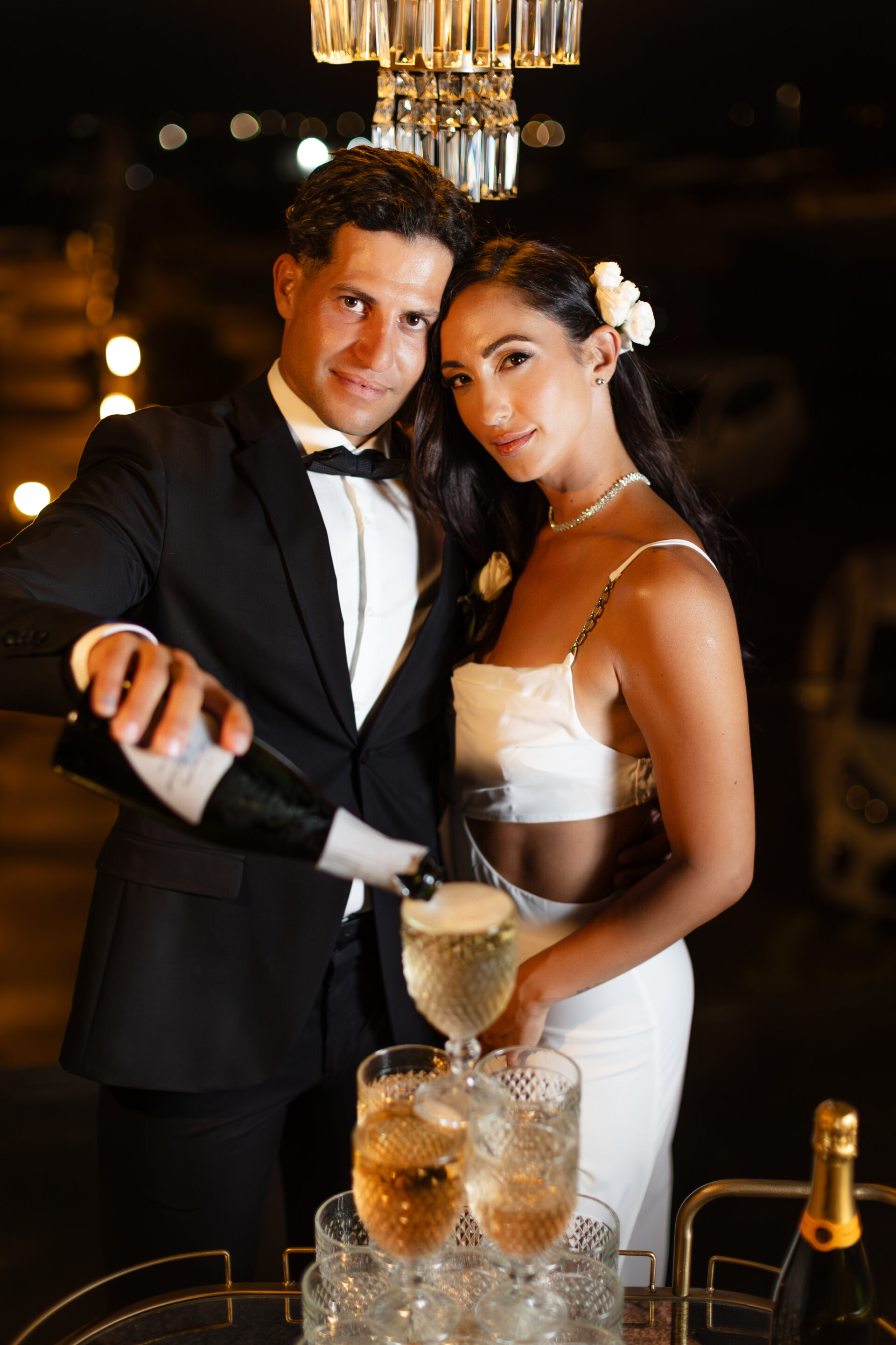 Santorini photographer bride and groom champagne