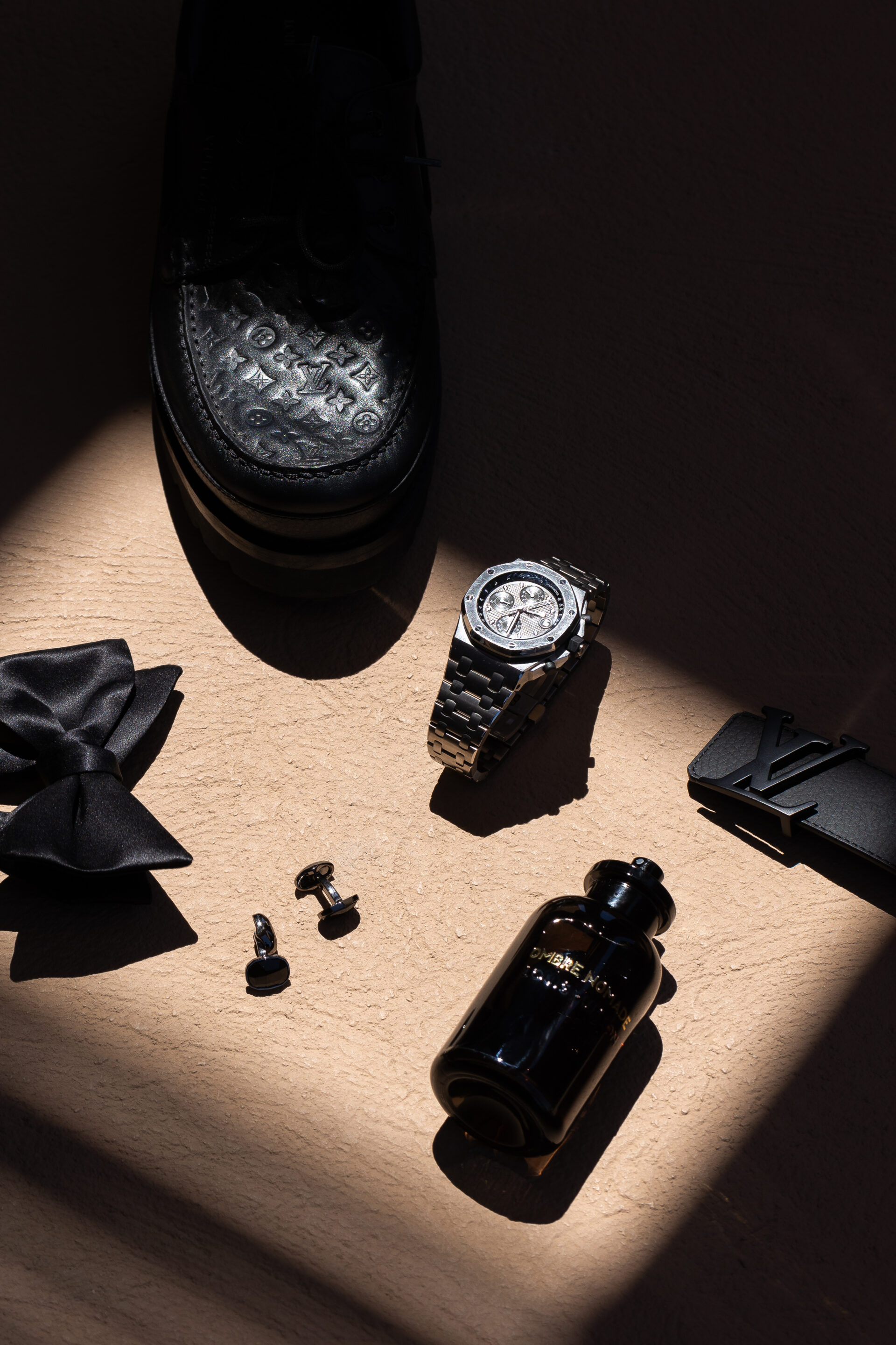 Groom accessories by Santorini wedding photographer