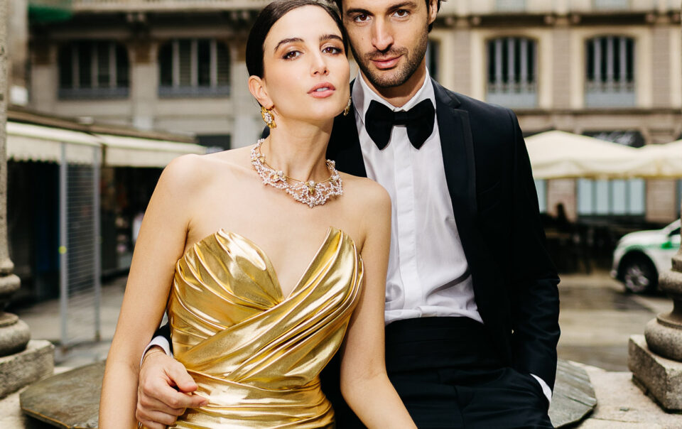 santorini wedding photographer couple in gold dress