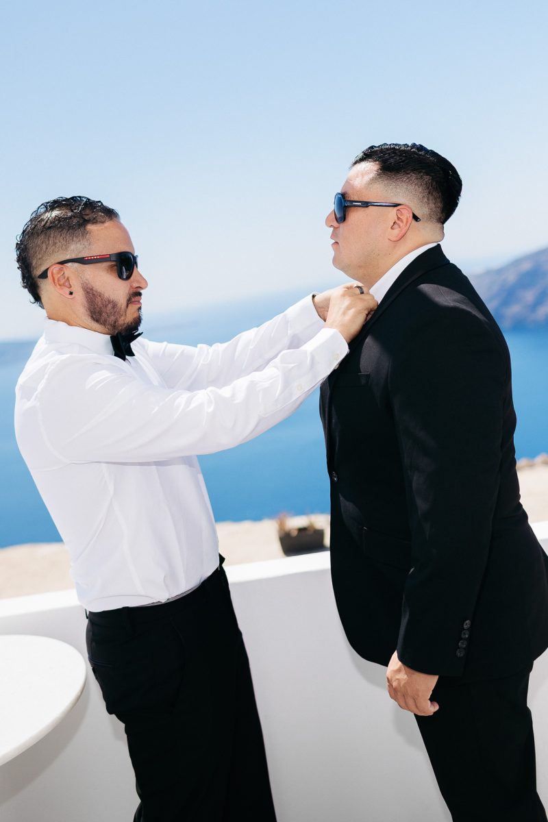 Groom prep moment – Santorini wedding photographer