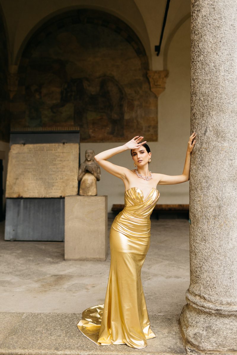 santorini wedding photographer bride in gold dress