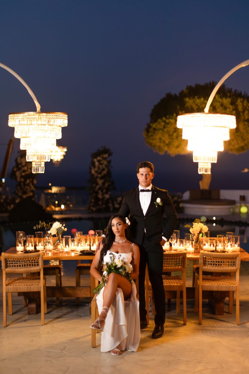 Santorini wedding photographer captures luxury evening bride groom portrait