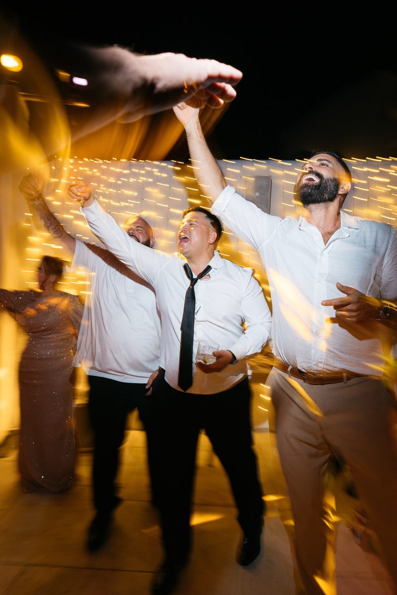 Santorini wedding photographer dance party photo