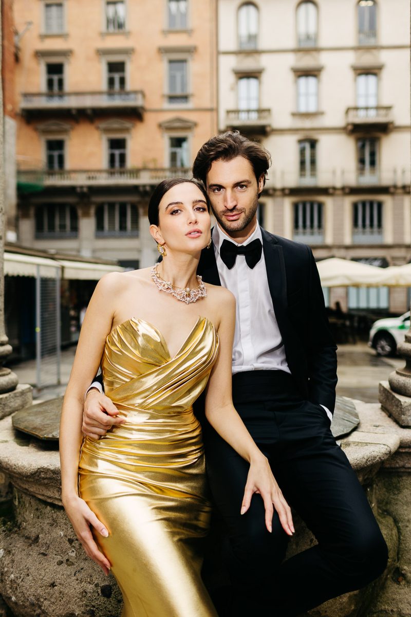 santorini wedding photographer couple in gold dress